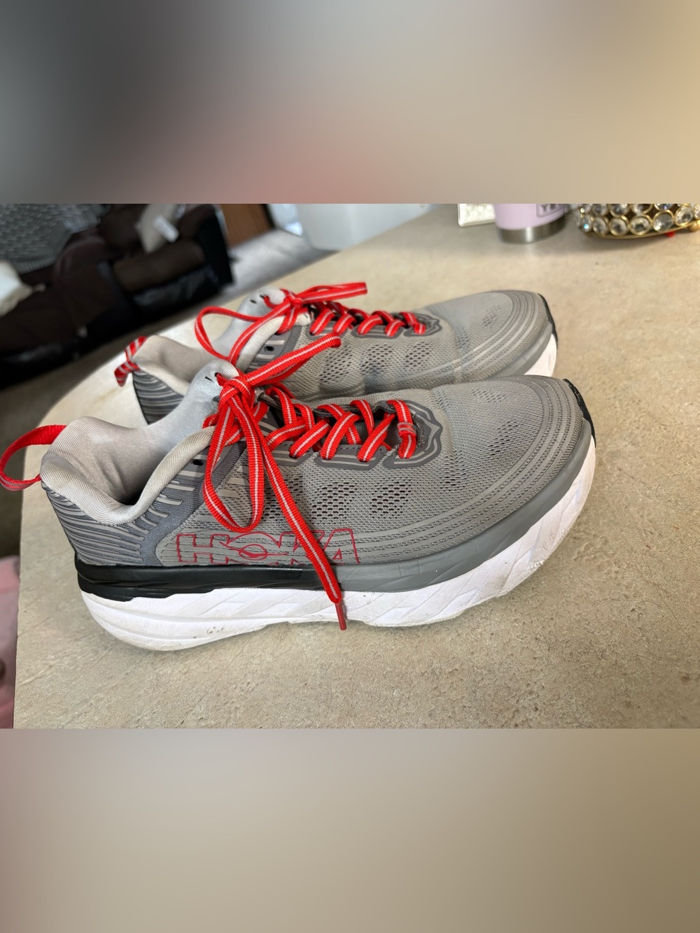 Hoka Men’s Gray Athletic Sneakers with Red Laces and Accents